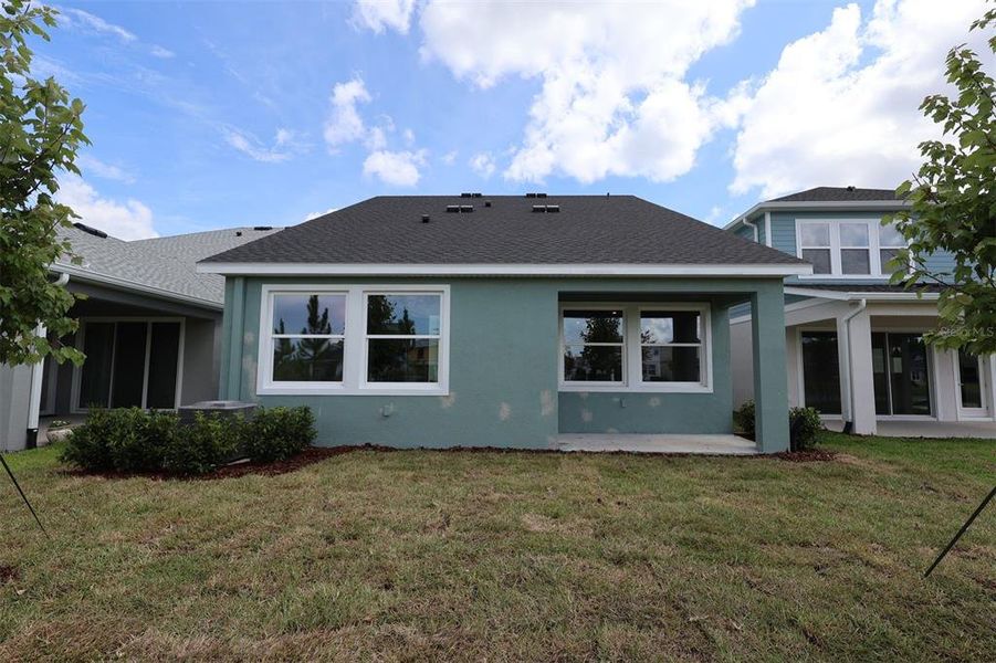 Exterior details and patio area of a home in Chapel Crossings - Garden Series, Wesley Chapel (Image 3).