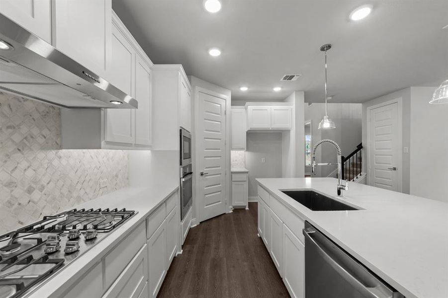 Furnished interior view inside a new home in Karis - Village Series, Crowley (Image 8). Furnished interior view inside a new home in Karis - Village Series, Crowley (Image 8).