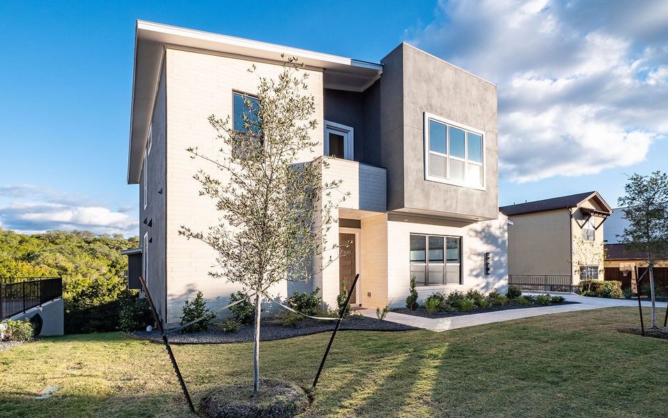 Front exterior of a new home in Preserve at Lakeway, Lakeway, TX, highlighting curb appeal (Image 2). Front exterior of a new home in Preserve at Lakeway, Lakeway, TX, highlighting curb appeal (Image 2).