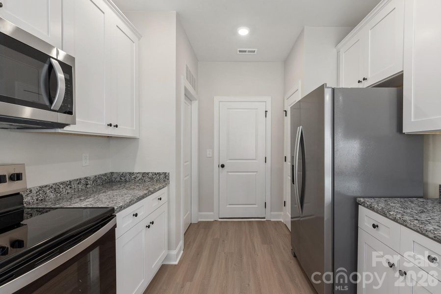 Furnished interior view inside a new home in Ascot Woods, Charlotte (Image 4).