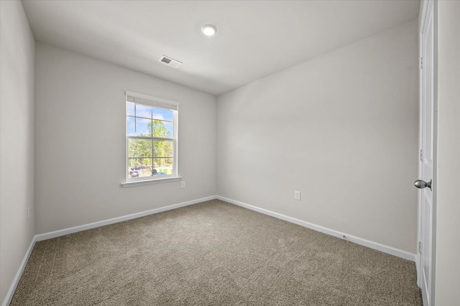 Representative unfurnished interior of a home built from the Palmetto II by McGuinn Homes in Clarke Townes, Anderson (Image 76).