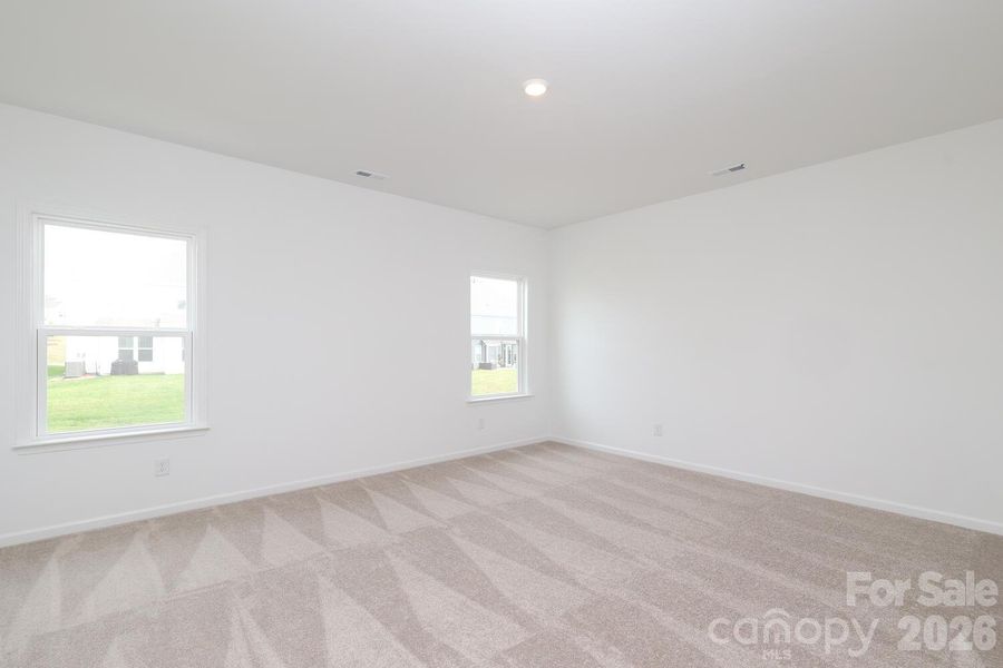 Spacious, unfurnished interior of a new home in Estates at Sugar Creek, Indian Land (Image 36).