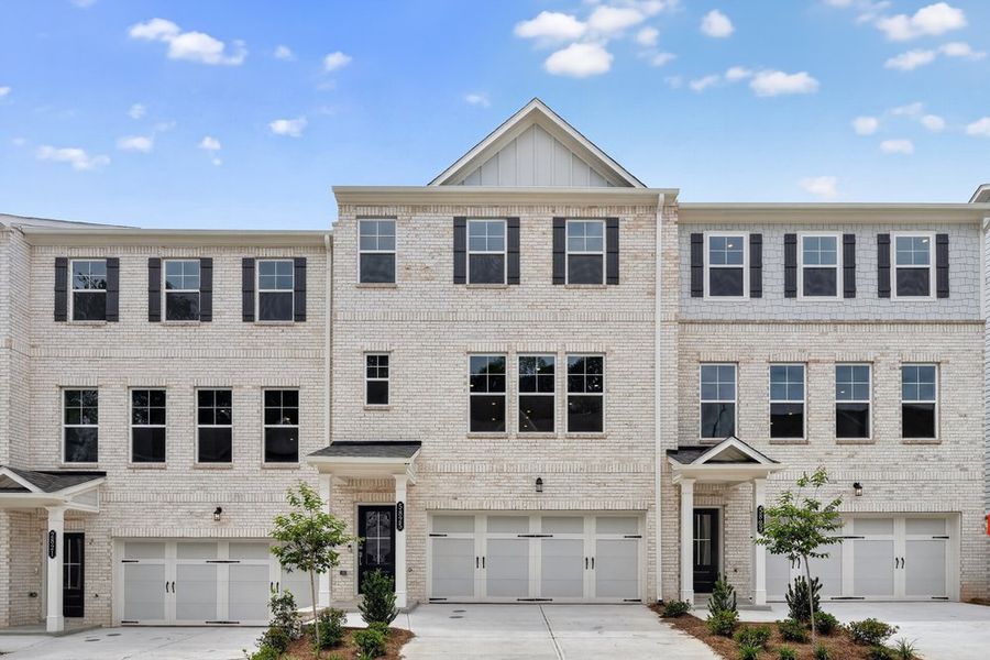 Front exterior of a new home in Somerset at Veterans Memorial, Mableton, GA, highlighting curb appeal (Image 1). Front exterior of a new home in Somerset at Veterans Memorial, Mableton, GA, highlighting curb appeal (Image 1).