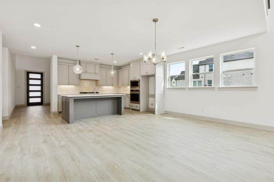 Open and flowing, our Versailles II floor plan is an entertainers dream home!