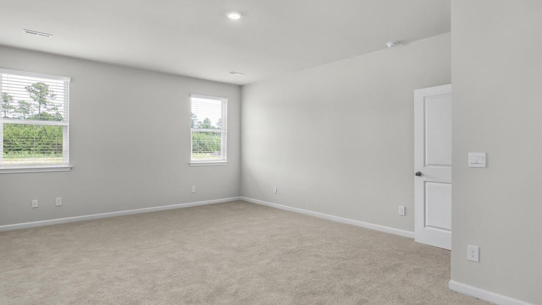 Spacious, unfurnished interior of a new home in Surfside Landing, Hubert (Image 21).