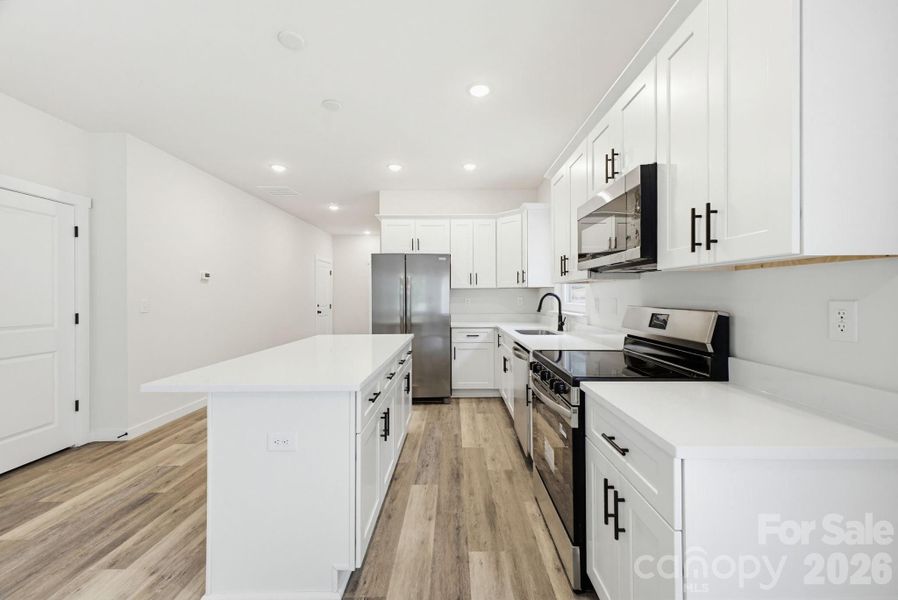 Furnished interior view inside a new home in , Hickory (Image 13).