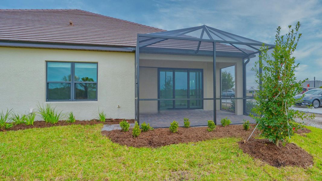 Exterior details and patio area of a home in Vistera of Venice Real Estate and Homes for Sale in Venice, FL - Neal Communities, Nokomis (Image 3). Exterior details and patio area of a home in Vistera of Venice Real Estate and Homes for Sale in Venice, FL - Neal Communities, Nokomis (Image 3).