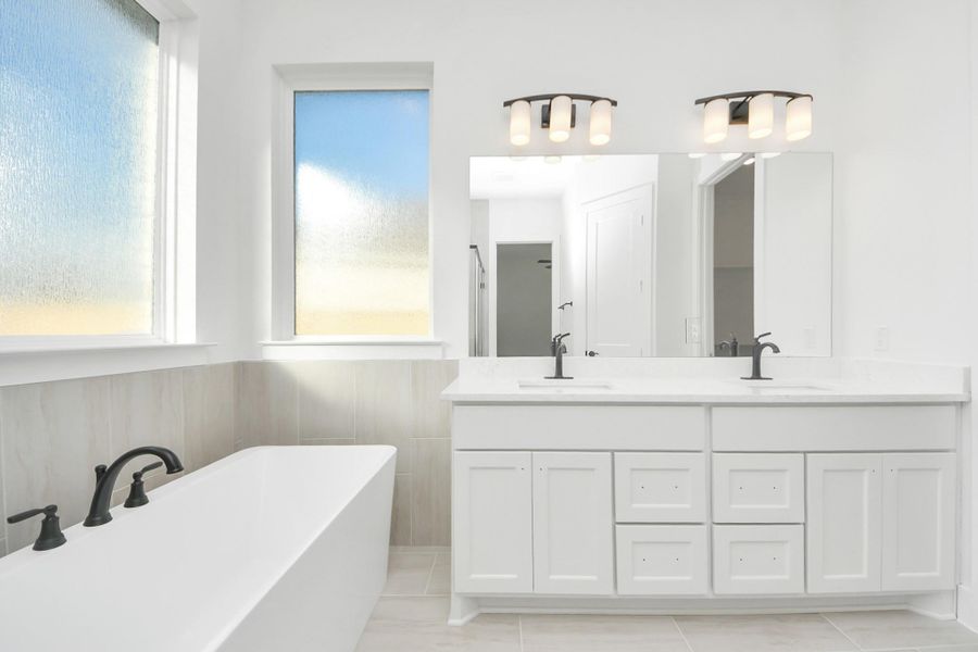 Furnished interior view inside a new home in Meridiana, Manvel (Image 11).