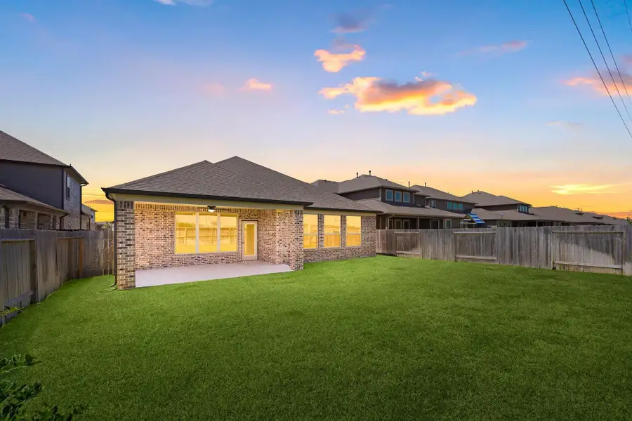Front exterior of a new home in Morton Creek Ranch, Katy, TX, highlighting curb appeal (Image 2). Front exterior of a new home in Morton Creek Ranch, Katy, TX, highlighting curb appeal (Image 2).