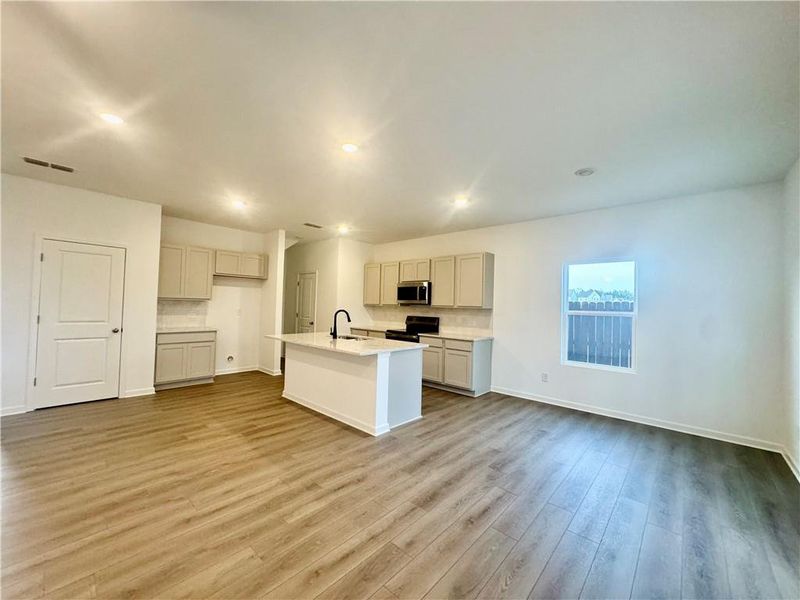 Furnished interior view inside a new home in Eastlyn Crossing, Flowery Branch (Image 5).