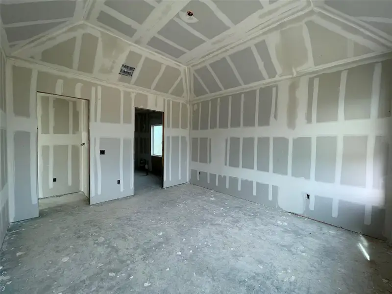 Primary Bedroom with elevated ceiling