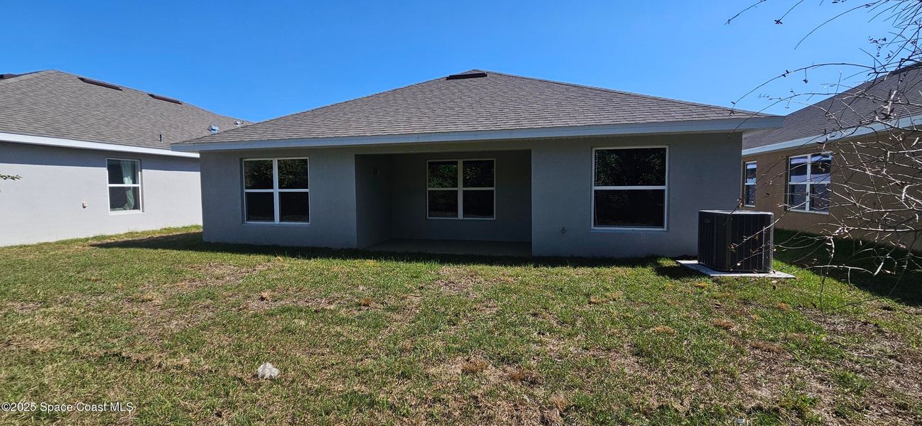 Exterior details and patio area of a home in Hickory Ridge, Cocoa, FL, Cocoa (Image 2).