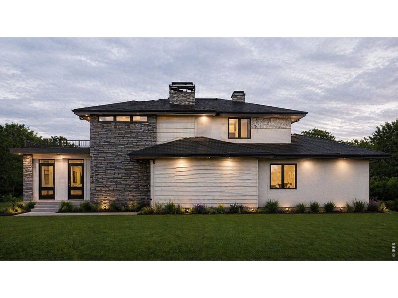 Front exterior of a new home in , Longmont, CO, highlighting curb appeal (Image 4).