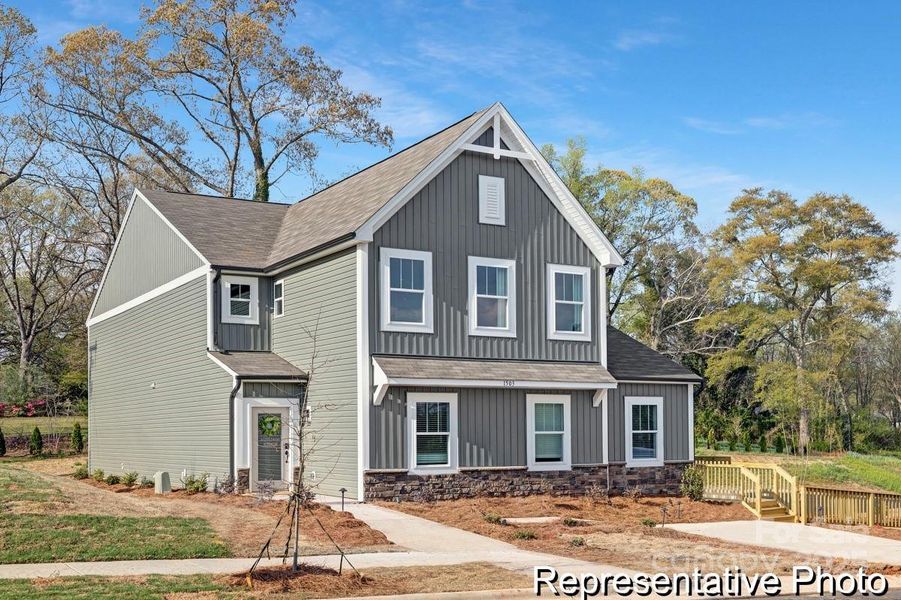 Front exterior of a new home in Autumn Ridge, High Shoals, NC, highlighting curb appeal (Image 1). Front exterior of a new home in Autumn Ridge, High Shoals, NC, highlighting curb appeal (Image 1).