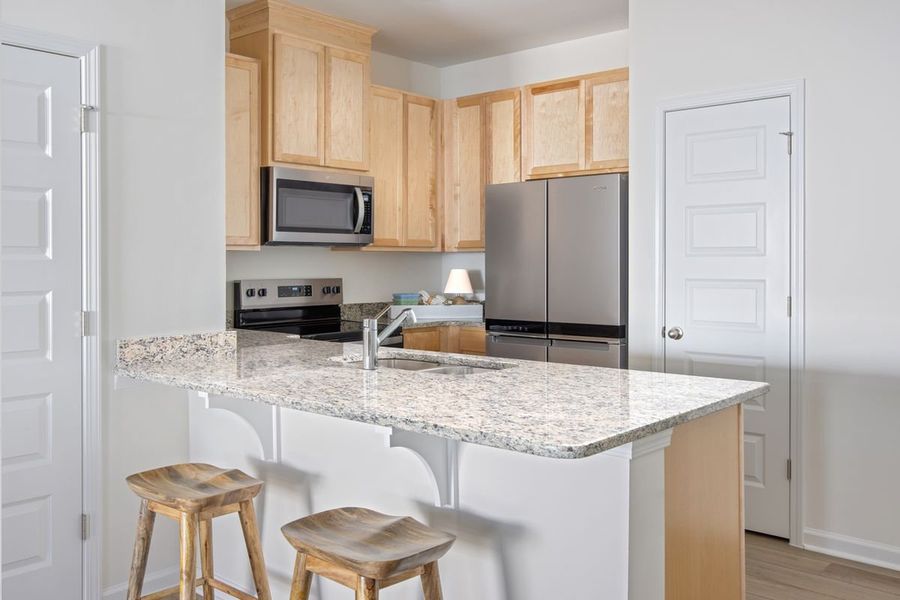 Furnished interior in a model home at Richland Reserve in Raleigh (Image 8).