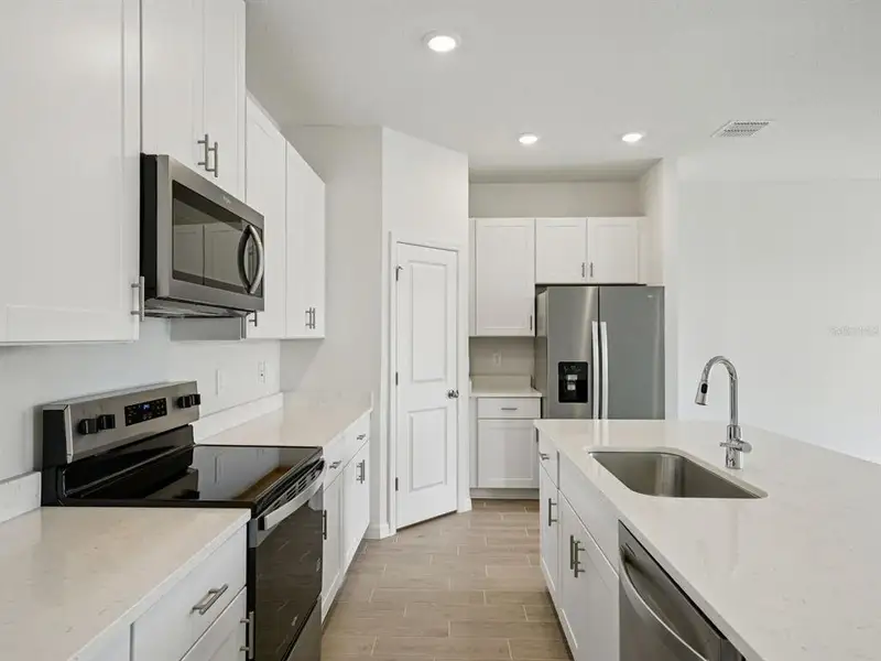 Furnished interior view inside a new home in Oakfield Trails - Classic Series, Parrish (Image 8).