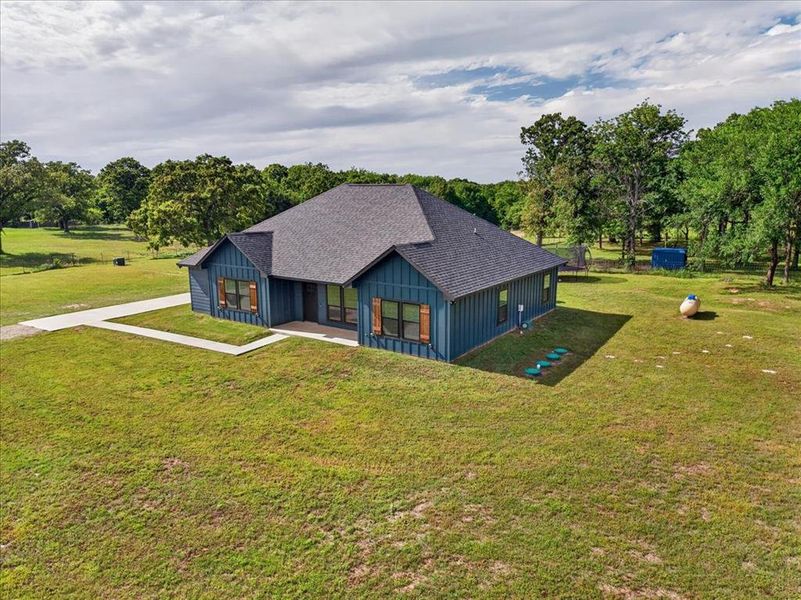 Front exterior of a new home in , Athens, TX, highlighting curb appeal (Image 21).