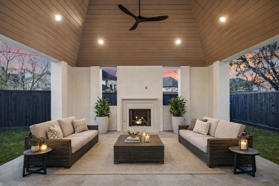 A vaulted, wood clad ceiling and recessed lighting frame this covered pavilion, anchored by a built in fireplace for year round use. Designed as a true outdoor living room, the space works equally well for relaxed evenings or larger gatherings. **Virtually staged *Previous build by Arch Angelo** A vaulted, wood clad ceiling and recessed lighting frame this covered pavilion, anchored by a built in fireplace for year round use. Designed as a true outdoor living room, the space works equally well for relaxed evenings or larger gatherings. **Virtually staged *Previous build by Arch Angelo**