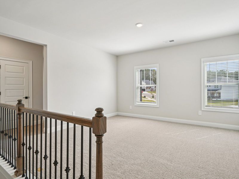 Spacious, unfurnished interior of a new home in Vines at Mill Creek - Legacy Series, Braselton (Image 14).