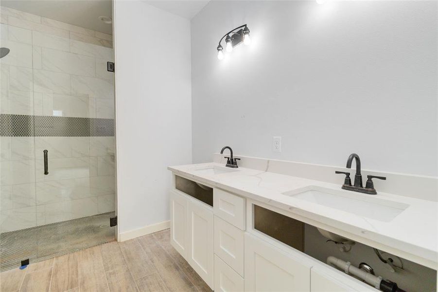 Primary ensuite with tiled walk-in shower