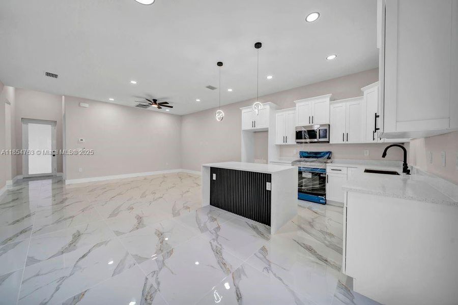 Furnished interior view inside a new home in , Lehigh Acres (Image 3).
