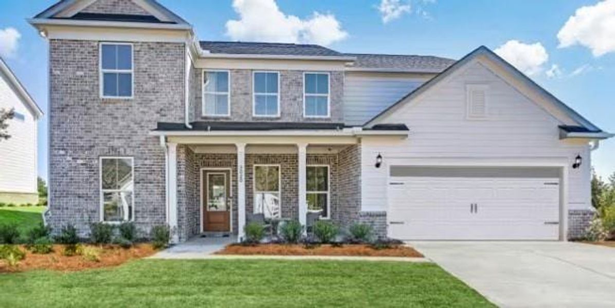 Front exterior of a new home in Haverhill Estates, Dacula, GA, highlighting curb appeal (Image 1).