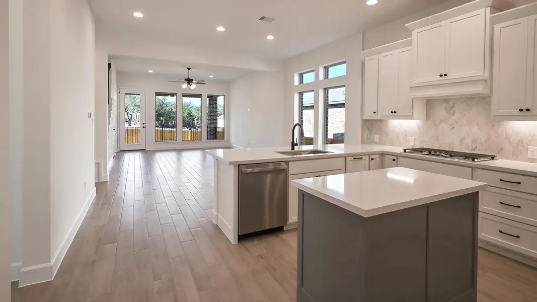 Furnished interior view inside a new home in 6 Creeks 50', Kyle (Image 6).