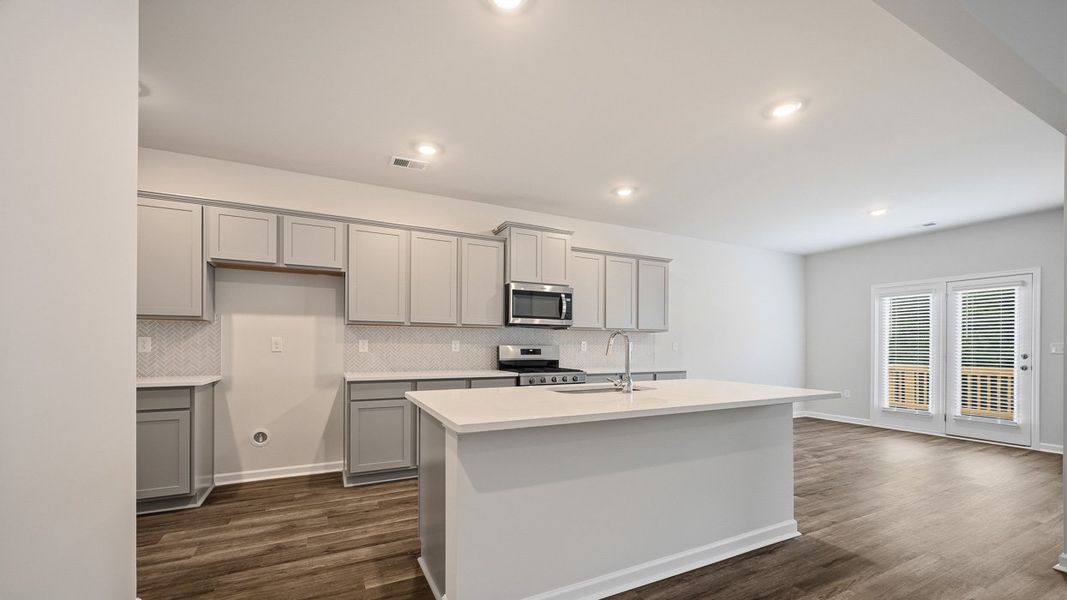Furnished interior view inside a new home in Brooks Station, Dacula (Image 4).