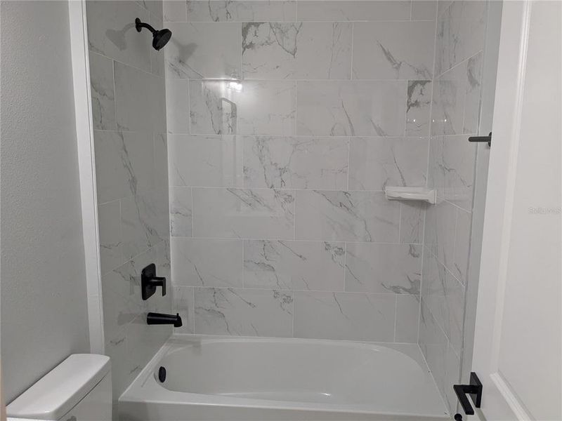 Furnished interior view inside a new home in , Port Charlotte (Image 6). Furnished interior view inside a new home in , Port Charlotte (Image 6).