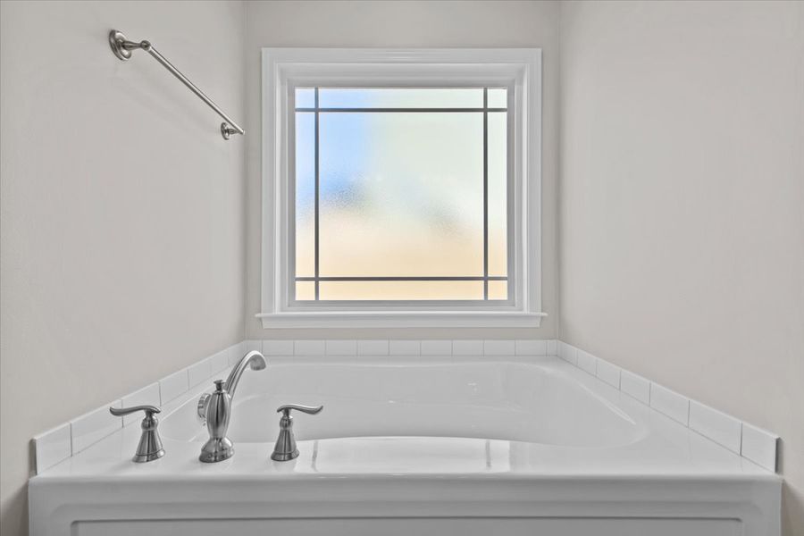 Representative interior finishes for a home built from the Brentwood by Enchanted Homes in Lonesome Dove, San Antonio (Image 11).