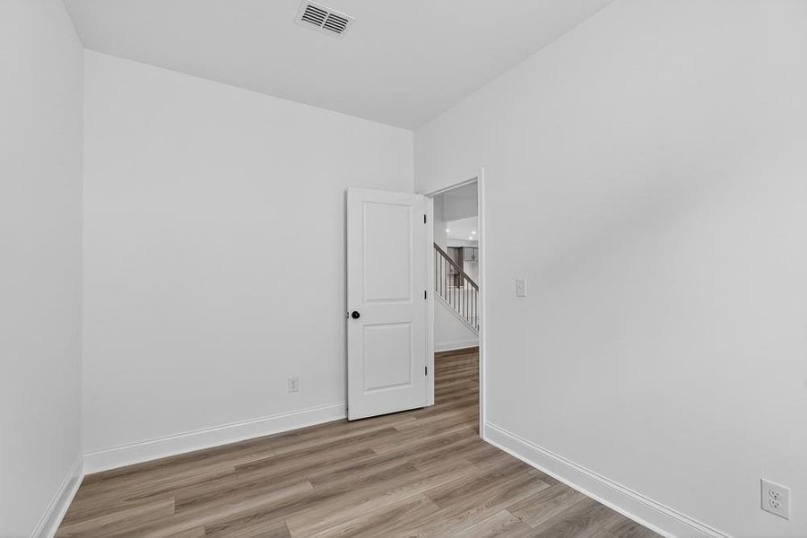 Spacious, unfurnished interior of a new home in Bailey Fence, Dacula (Image 27).