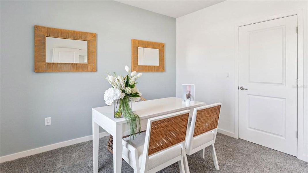 Furnished interior view inside a new home in Halifax Plantation Villas, Ormond Beach (Image 12).