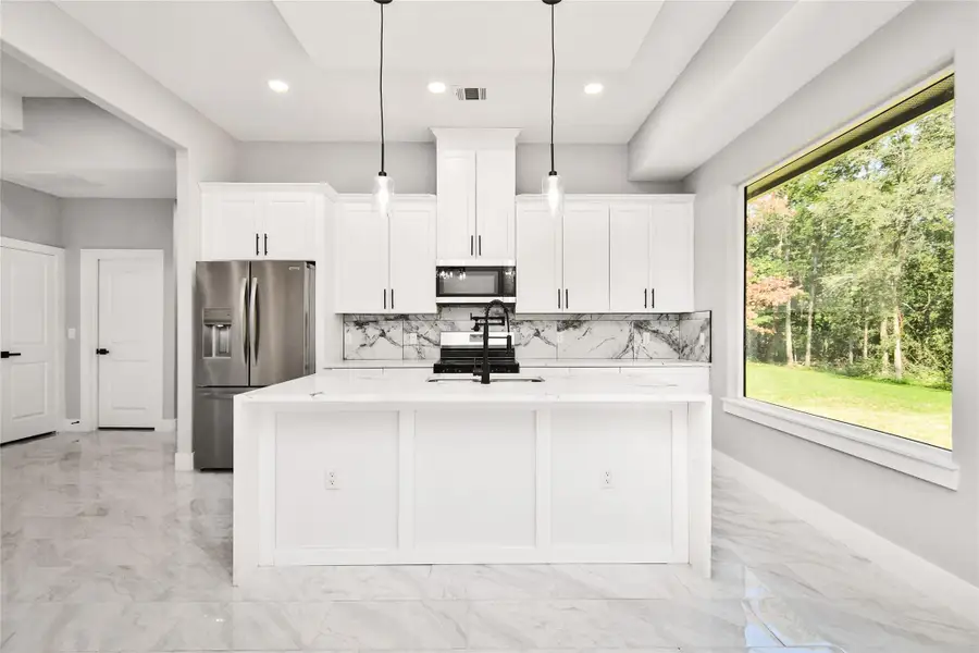 Furnished interior view inside a new home in , Willis (Image 10).
