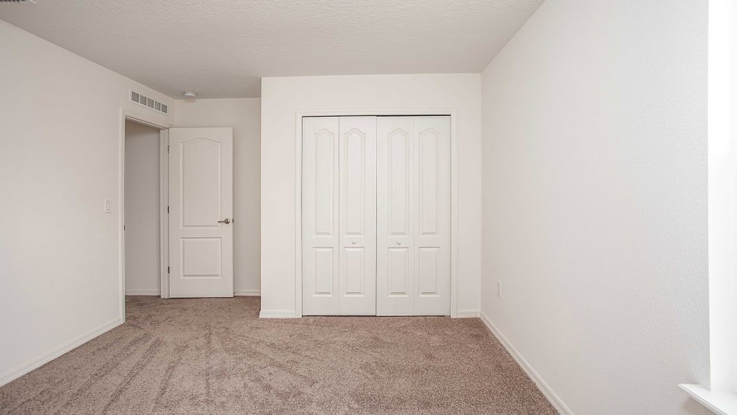 Representative unfurnished interior of a home built from the Carlisle by Maronda Homes in Crosswinds, Haines City (Image 38).