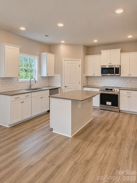 200 Fostoria Place | Albemarle, NC 28001. Built by Adams Homes - Affordable NC Home 2307 Square Feet - Kitchen