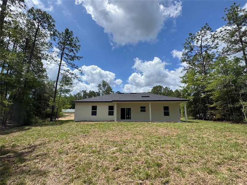 Exterior details and patio area of a home in , Citrus Springs (Image 20).