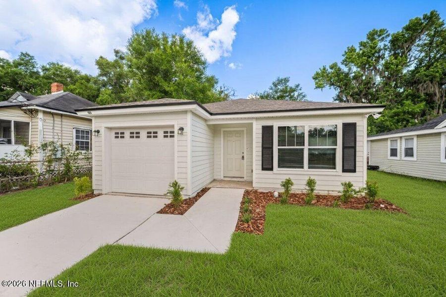 Front exterior of a new home in , Jacksonville, FL, highlighting curb appeal (Image 22).