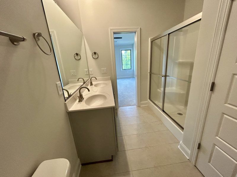 Furnished interior view inside a new home in Trellises, High Point (Image 10).