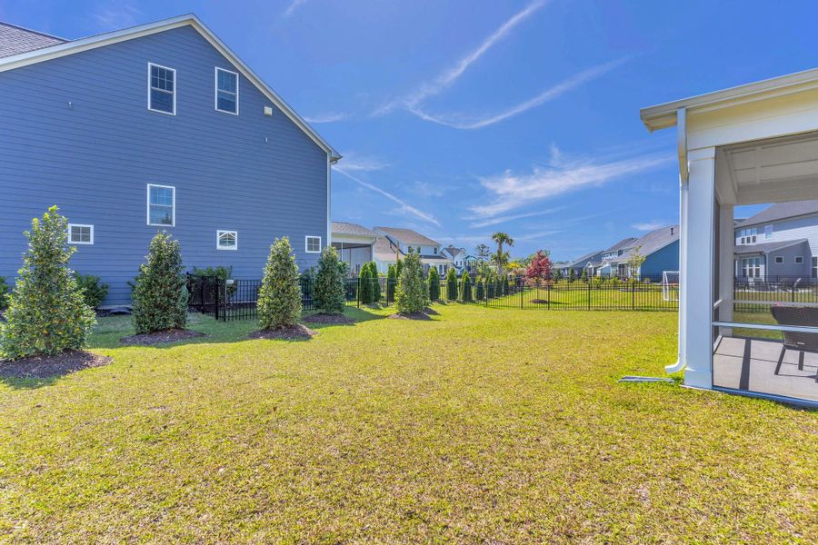 Representative exterior details of a home built from the The Amherst by RobuckHomes in Windwater, Hampstead (Image 3).