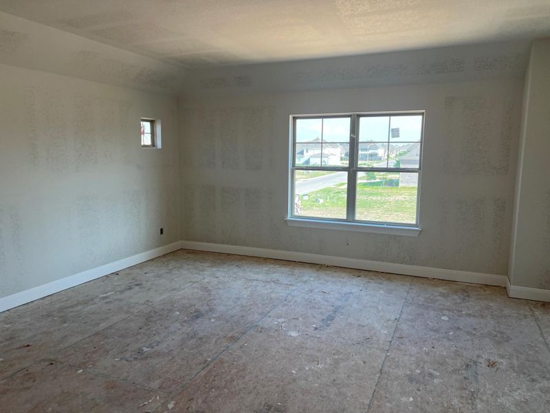 Unfurnished room with baseboards Unfurnished room with baseboards
