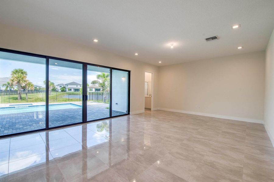 Furnished interior view inside a new home in Apex at Avenir, Palm Beach Gardens (Image 3).