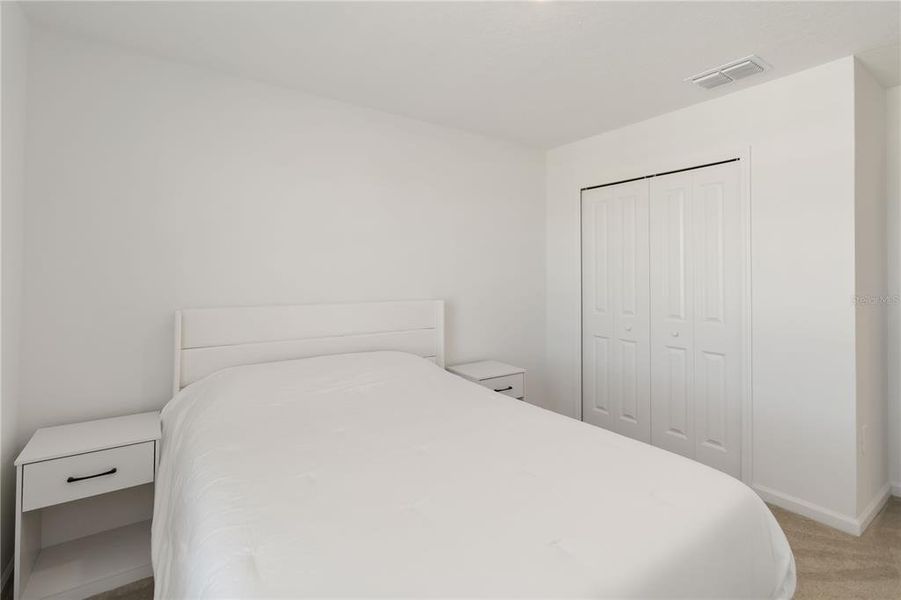 Furnished interior view inside a new home in Peace Creek Reserve: Manor Key Collection, Winter Haven (Image 40).