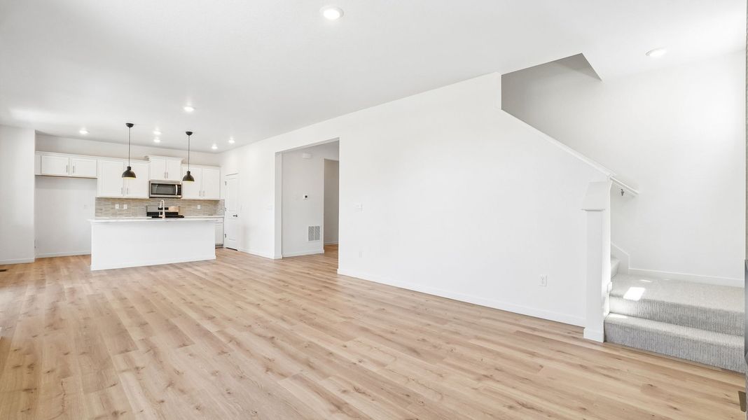 Spacious, unfurnished interior of a new home in Trails at Crowfoot, Parker (Image 11).