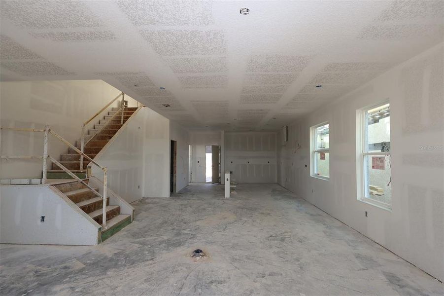 In-progress construction of a new home in Lake Star at Ovation, Winter Garden, FL (Image 16).