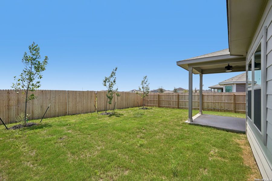 Exterior details and patio area of a home in Remington Ranch, San Antonio (Image 4).