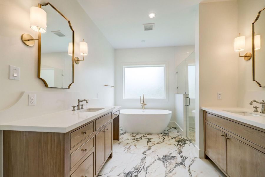 PRIMARY BATHROOM - Previous work by the builder, not representation of current build.