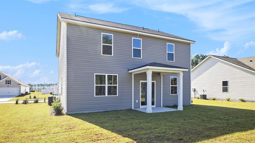 Exterior details and patio area of a home in Stanbury Creek, Supply (Image 4).