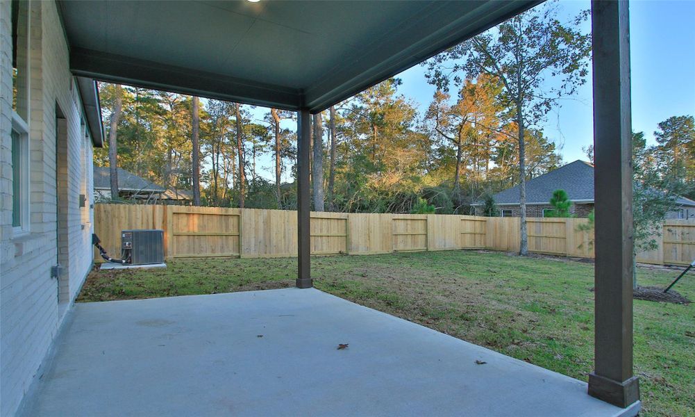 Exterior details and patio area of a home in The Woodlands Hills, Willis (Image 16). Exterior details and patio area of a home in The Woodlands Hills, Willis (Image 16).