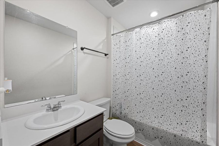 Full bath with vanity and shower / bath combo Full bath with vanity and shower / bath combo
