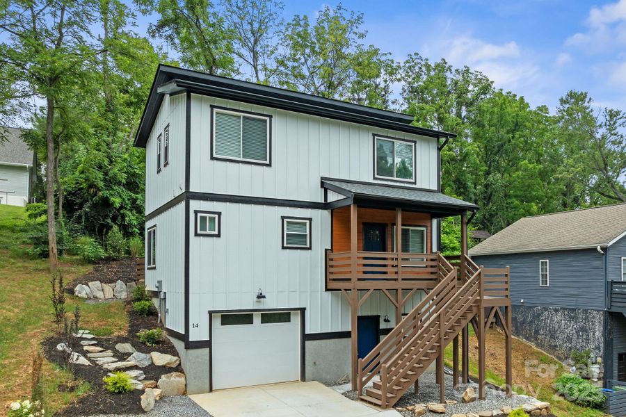 Front exterior of a new home in , Asheville, NC, highlighting curb appeal (Image 23). Front exterior of a new home in , Asheville, NC, highlighting curb appeal (Image 23).